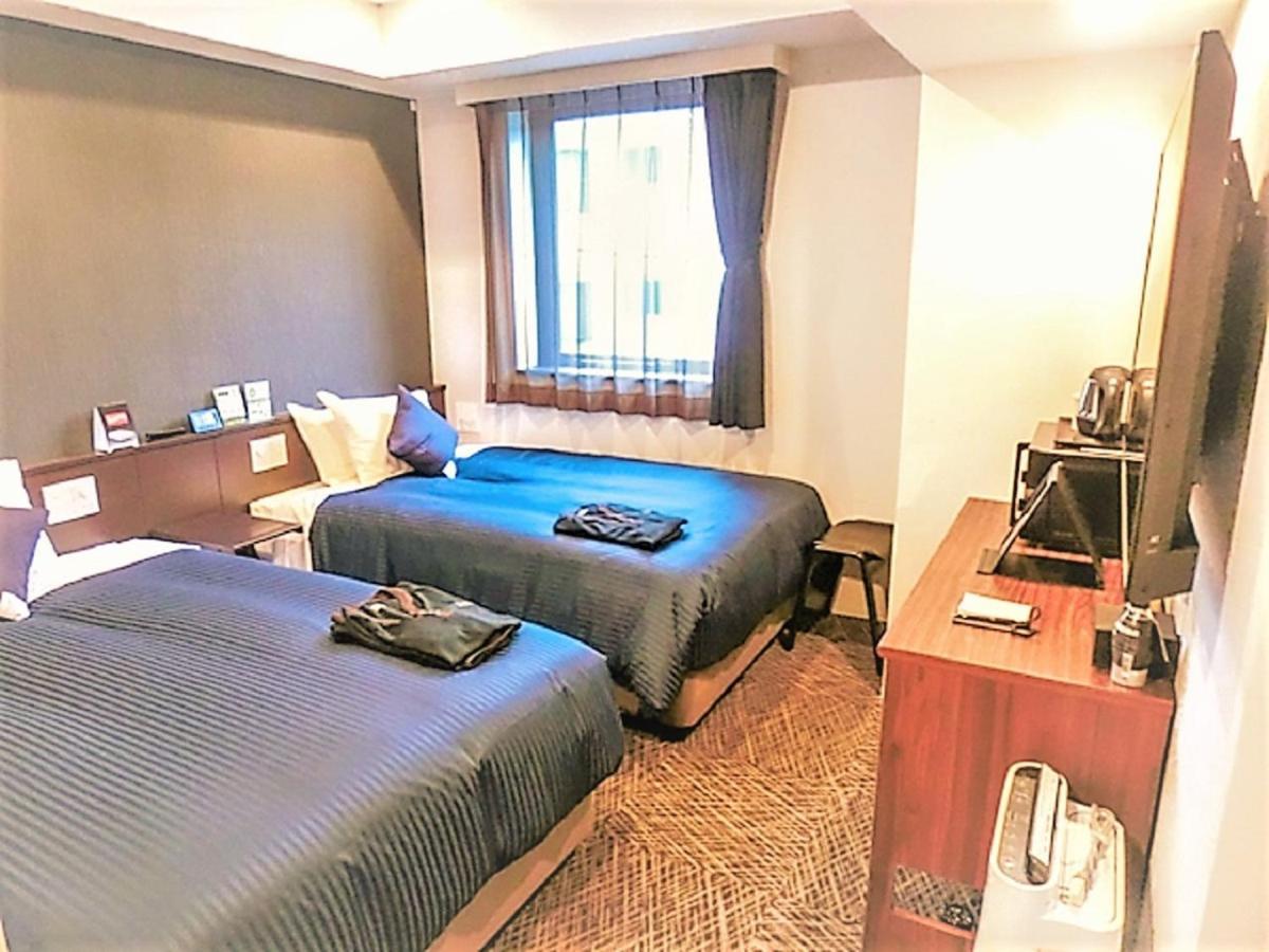 Natural Hot Spring Hotel Livemax Premium Hiroshima Exterior photo