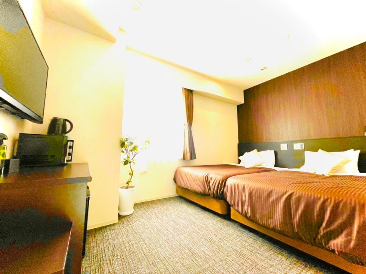 Natural Hot Spring Hotel Livemax Premium Hiroshima Exterior photo