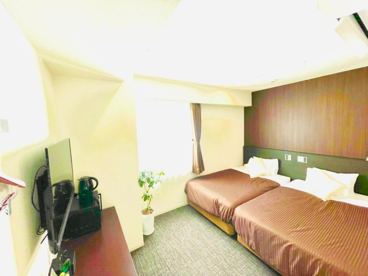 Natural Hot Spring Hotel Livemax Premium Hiroshima Exterior photo